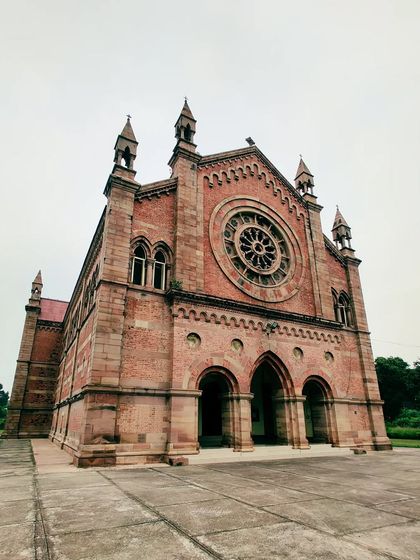 The impressive facade of the Kanpur Memorial Church, a beautiful example of Lombardic Gothic architecture.