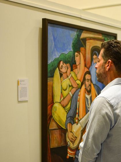 A visitor contemplates a painting at our 'The Masters and The Modern 2024' exhibition. We are grateful for the unwavering support of our art-loving community.