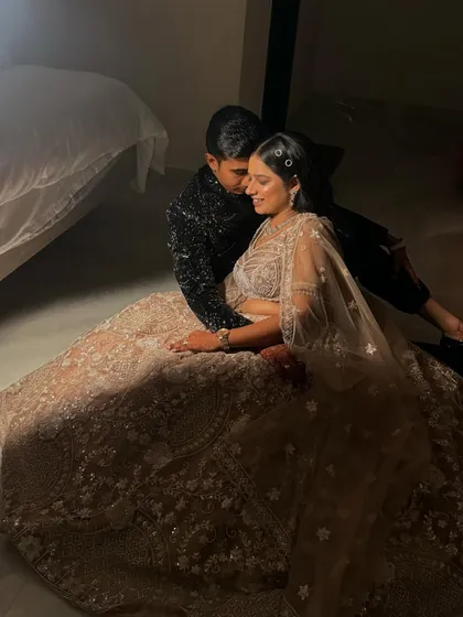 Another beautiful shot from their sangeet photoshoot, capturing a moment of love and happiness.