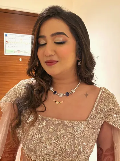 The fifth and final look for this bride's journey: a radiant and graceful reception look with soft, shimmering eyes.