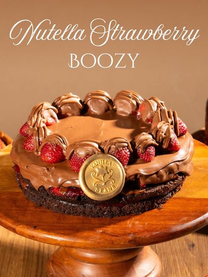 For those who like a little kick, our Boozy Nutella Strawberry cake. We infuse the sponge with premium rum for a smooth, grown-up warmth in every bite.