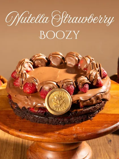 For a grown-up celebration, our Boozy Nutella Strawberry cake is infused with your choice of rum or liqueur for a warm, indulgent finish.