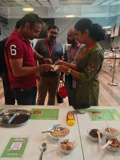 Connection is a huge part of my wellness philosophy. Here I am at a corporate event, helping employees build their own healthy snacks. These interactive stations are great for team building and starting conversations about nutrition in a relaxed, informal setting.