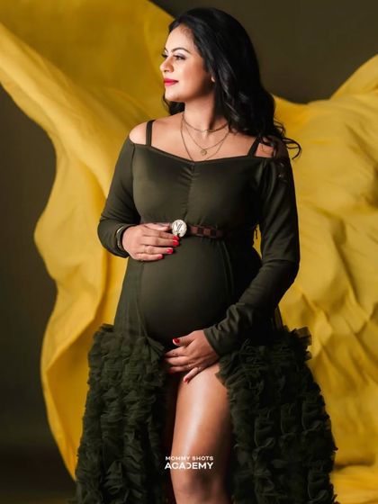 A powerful shot with a flowing yellow fabric, demonstrating how to incorporate movement and drama.