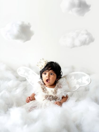 A gasp of surprise! I love capturing the full range of a baby's expressions during our themed photoshoots.