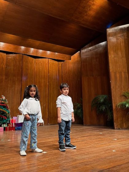 This pair shows that confidence can be quiet and strong, as they hold their positions on stage.