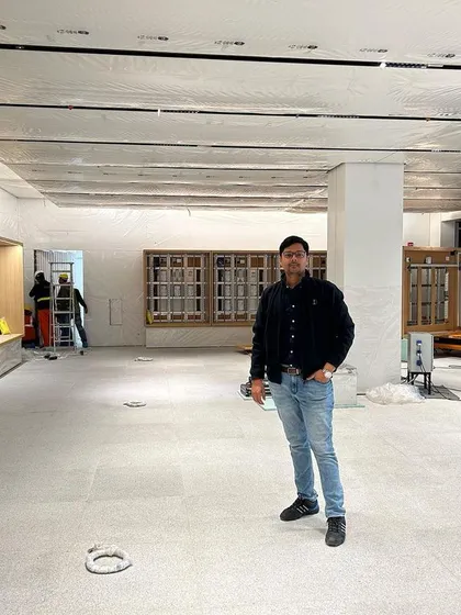 A photo of me on-site at the Apple store during its construction. Being personally present on-site for such critical projects is fundamental to how we work, ensuring every stage meets our standards.