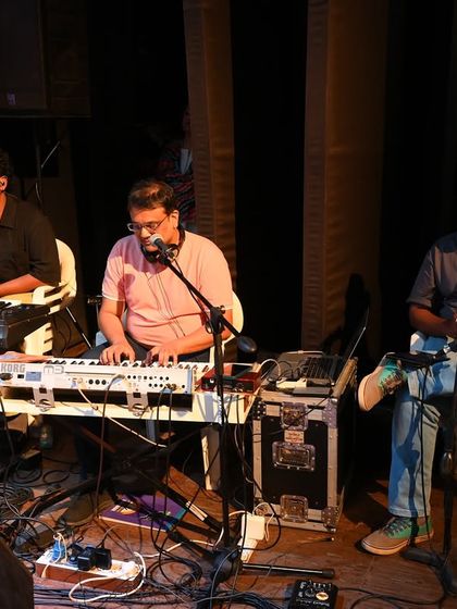 Our talented keyboardists and flutist during a performance. Live instrumentation is a key part of our showcases, providing a rich musical experience.
