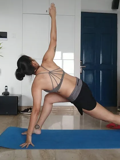 A demonstration of the extended side angle pose. This asana is excellent for stretching the entire side of the body and strengthening the legs.