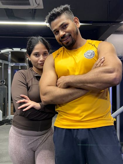 Posing together after a tough workout. It's all about having fun and supporting each other.