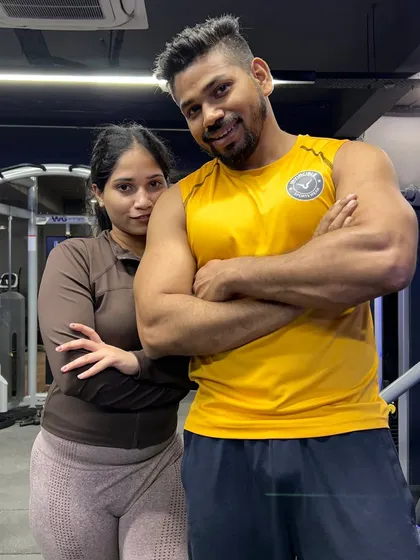 Posing together after a tough workout. It's all about having fun and supporting each other.
