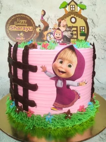 Another take on the popular Masha and The Bear theme, this time with a lovely pink finish. This custom cake for Sharayu features Masha and all her forest friends, ready for a birthday adventure.
