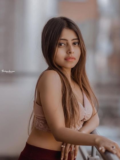 A simple, beautiful portrait with a clean background. The focus is entirely on the subject's face and expression.