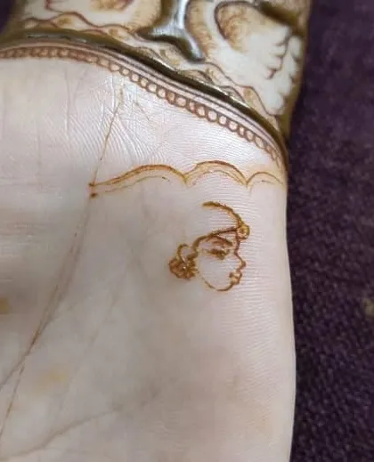 Another practice sketch of a bride's profile, this time with a maang tikka (headpiece).