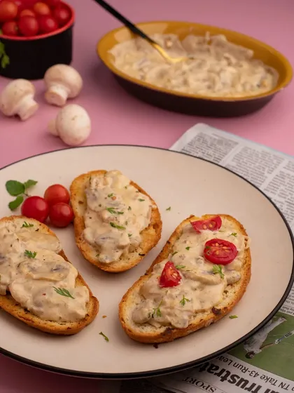 A wider shot of our mushroom toast platter. The composition with multiple pieces and fresh ingredients makes for a great menu photo.