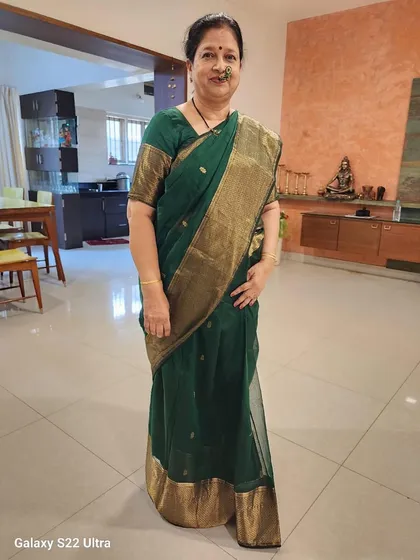 We are overjoyed to see our customer looking absolutely radiant in our green Maheshwari silk cotton saree. Her smile says it all. This is why we do what we do, to see our sarees become a part of your special moments.