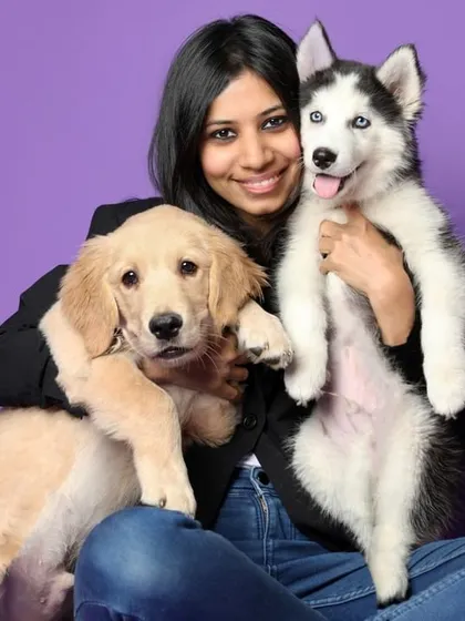 The purest form of love is between a hooman and their puppies. This photo captures that special bond, showcasing a beautiful moment with a Golden Retriever and a Siberian Husky. I love creating portraits that the whole family will cherish forever.
