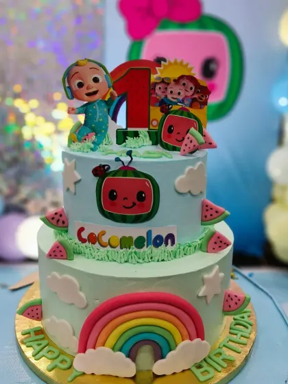 I had so much fun creating this two-tier Cocomelon themed cake for a first birthday party. It features a fondant rainbow, watermelon details, and all the beloved characters. I can work with your event planner to make sure the cake perfectly matches your party's decor.