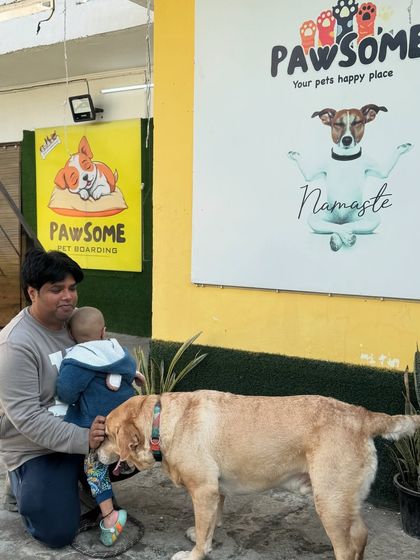 A gentle nuzzle from Buddy for his little human brother. These are the moments I cherish.