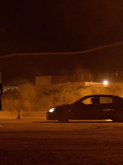 A behind the scenes look at a night drift session. This is the vibe on set: me, my drone, and a car burning rubber under the lights.
