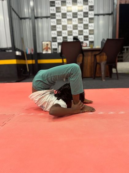 This is an advanced flexibility pose that demonstrates incredible control and spinal mobility. We build up to poses like this with daily stretching and conditioning.