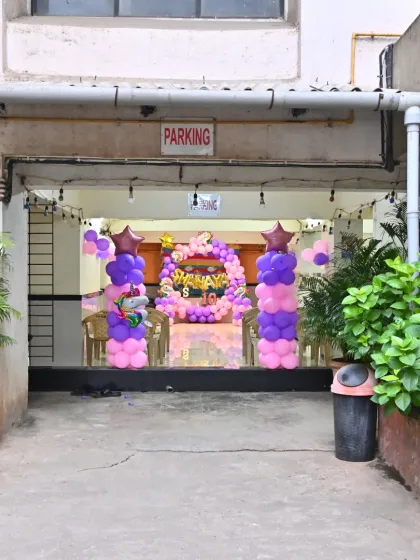 The view from the parking area, showing how our decorations create an exciting entrance for the party.