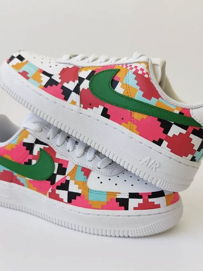 A stacked view of the Dhurrie weave custom Nikes. The pattern is continuous and wraps around the shoe, creating a seamless piece of wearable art.