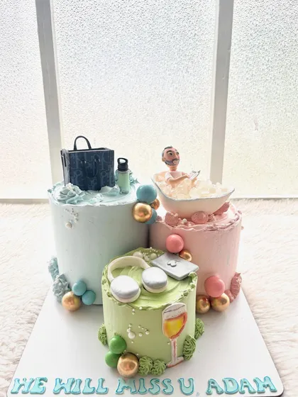 This farewell cake was so much fun to create. It was designed to capture the person's unique personality and hobbies, from taking ice baths while reading to his favorite headphones and bag. I can turn any inside joke into a sweet reality.