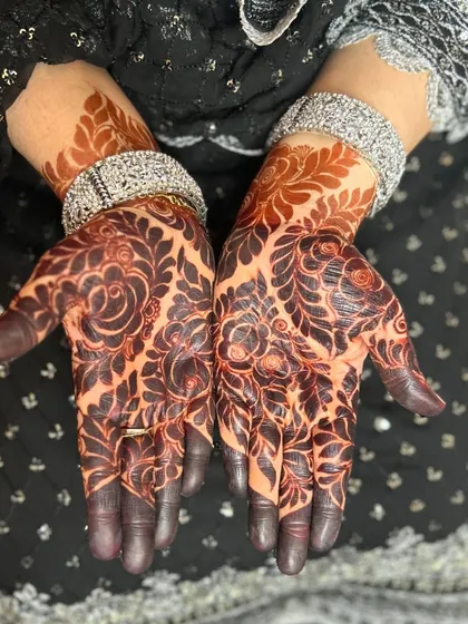 Another look at the rich floral stain, showing how the color settles into a deep, beautiful shade on the skin.