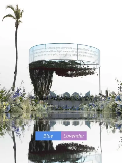 A modern and dreamy mandap design featuring a palette of blue and lavender. Set on the water, this floating floral structure created a unique and unforgettable backdrop for the wedding ceremony.