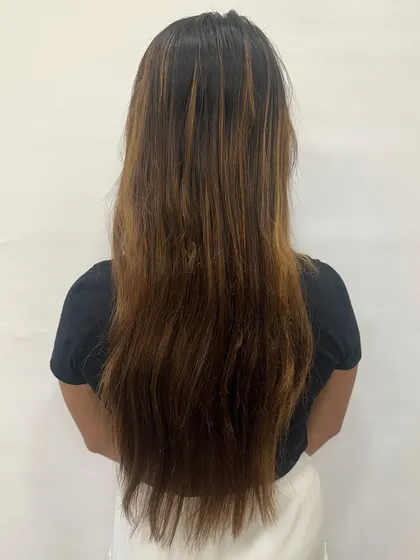 I call this look 'Hazelnut Chocolate Truffle'. It's a deep, rich brunette base with fine hazelnut highlights that add a subtle shimmer. This is a great option for anyone wanting to enhance their dark hair without a drastic change.