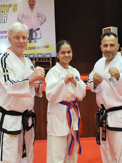 Another student from our academy with the Grandmasters, feeling inspired and motivated.