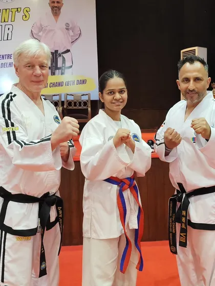 Another student from our academy with the Grandmasters, feeling inspired and motivated.