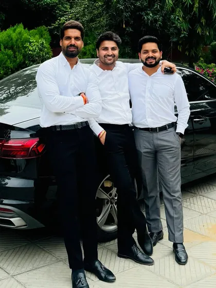 With my brothers. Family and professional life are intertwined, and their support is my foundation.
