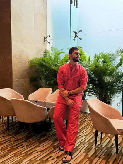 Keeping it simple and comfortable in a red kurta set. This is a great look for a daytime event, stylish yet relaxed.