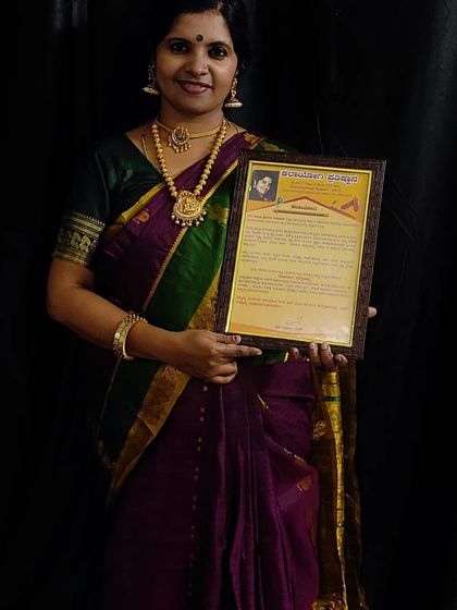 Proudly holding the Kalayogi award. This recognition fuels my passion to teach and share the beauty of Bharatanatyam.