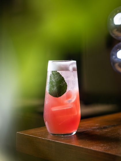 Indulge in sophistication with Ms. Monroe. A refreshing blend of litchi juice, raspberry cordial, fresh lime, kaffir leaf, and vegan foam.