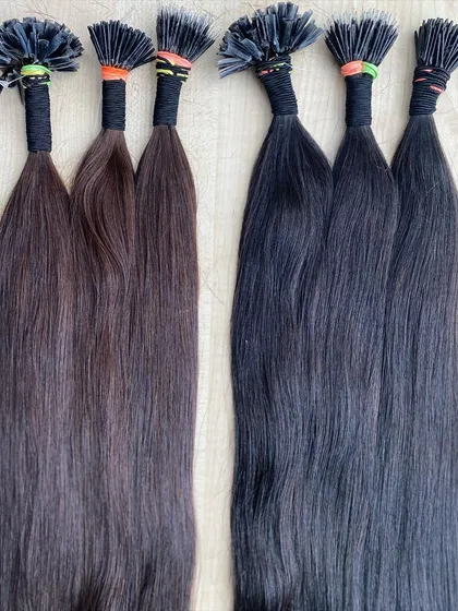 A side-by-side comparison of different colored I-Tip extensions, showing the range available for perfect color matching.