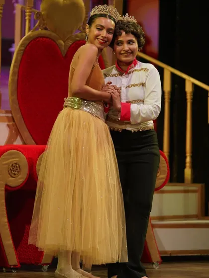 A candid moment of connection between our King and Queen backstage. The friendships formed during our productions are just as important as the performance itself.