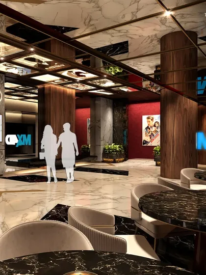The entrance to the MX4D theater, where guests can enjoy an immersive cinematic experience. The lobby features dark marble tables and comfortable seating, creating a sophisticated lounge area before the show.