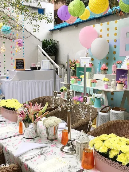 A "Ready to Pop" baby shower with a bright and cheerful pastel theme. The decor included colorful balloons, fresh flowers, and a fun, celebratory vibe for the mom-to-be.