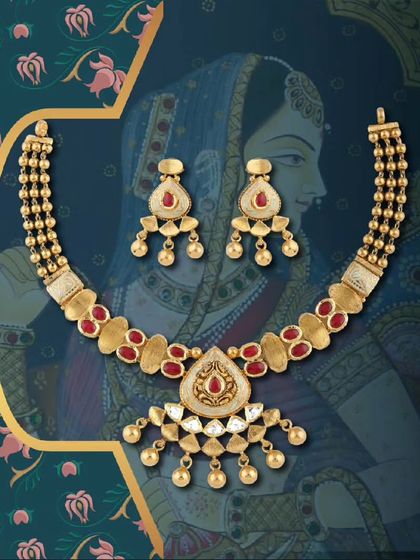 A beautiful necklace set featuring red stone accents and a unique pendant design. This piece is a fine example of our Pratab collection, blending heritage with contemporary flair.