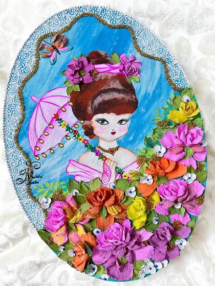 Sometimes I like to mix painting with sculpture, like in this whimsical piece. I painted the sweet character and her parasol, then surrounded her with a burst of 3D sculpted flowers, creating a unique mixed-media artwork that tells a story.