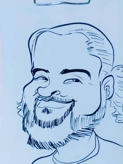 A caricature of a man with a friendly, smiling expression. The beard and hairstyle were fun to draw.