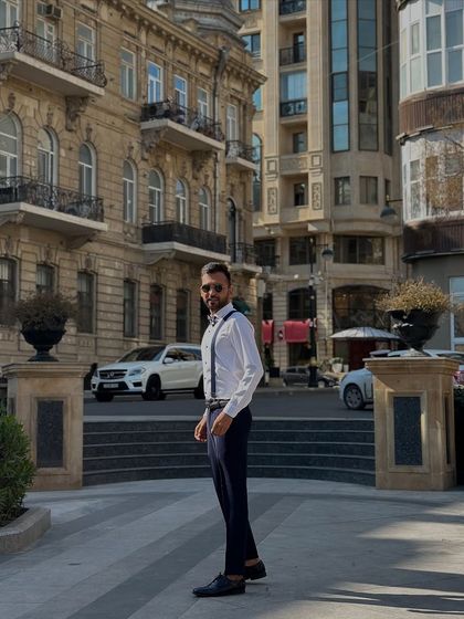 A side profile shot in my captain's outfit in Baku. This look was for a 60th birthday party, but the character and entertainment style can be tailored for any corporate travel theme.