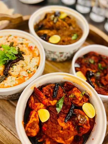 A spread of our popular South Indian dishes. This meal featured our flavourful Prawn Ghee Roast, Chicken Chettinad, and comforting Curd Rice, all made with freshly ground spices.