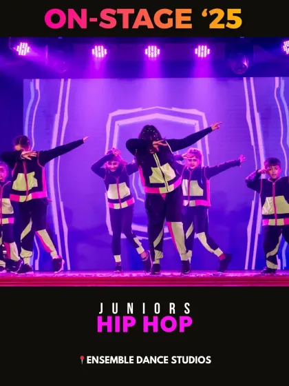 A dynamic pose from our juniors hip hop performance. The glow-in-the-dark elements on their costumes added a cool, futuristic vibe to the act.