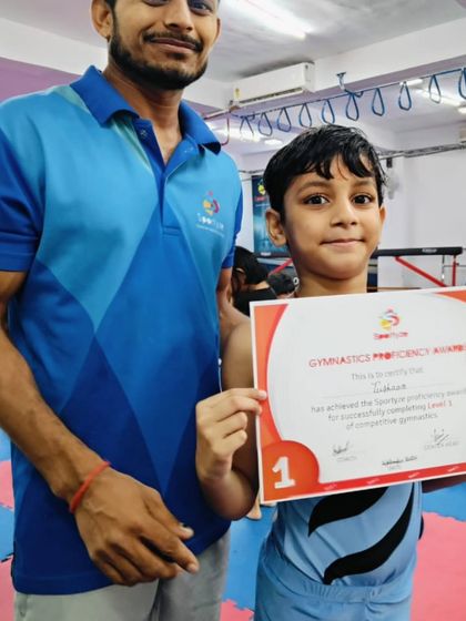 This student has earned his Level 1 proficiency award for competitive gymnastics.