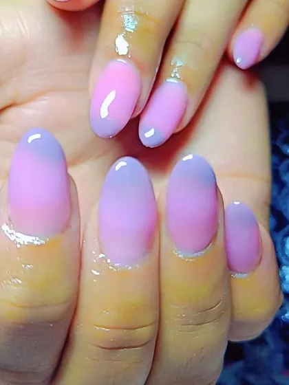 Ombre nails are a favorite for a reason. Here, I blended a soft pink into a lovely lavender for a smooth, dreamy gradient on almond-shaped nails. It’s an elegant and beautiful look that works for any occasion.
