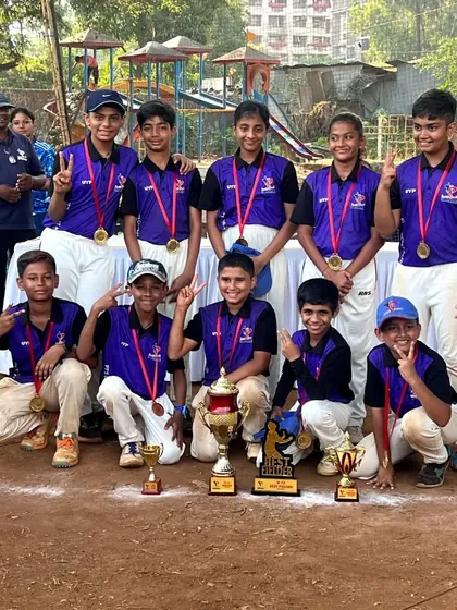 The PTPL 2023 U-12 champions, the Purple Team, posing with their trophies. Their victory gestures show the confidence gained from a successful tournament.
